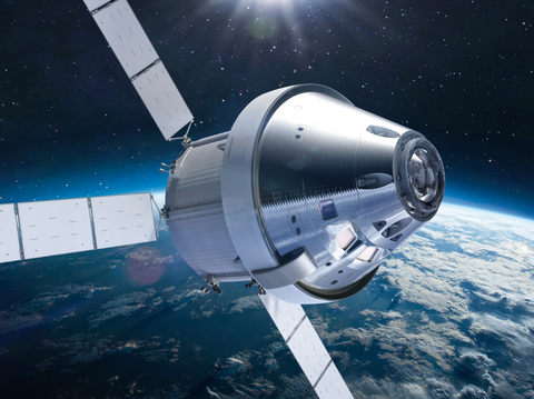 Orion spacecraft flight in space on orbit of Earth istock photo. Artemis space program. Expedition to Moon.